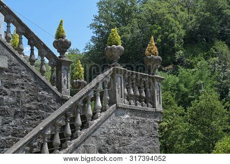 Staircase With Stone Columns And Plant Pots At The Corners, Typical Historical Garden Design In Bagn