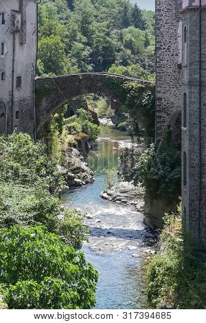 Magra River With The Ancient Bridge In Bagnone, A Small Town In Tuscany, Italy