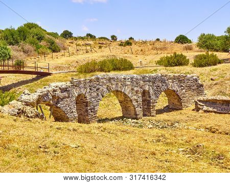 Remains Of The Roman Aqueduct Of Punta Paloma. Baelo Claudia Archaeological Site. Tarifa, Cadiz. And