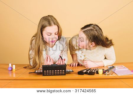 Experts In Colour. Adorable Small Makeup Artists Using Colour Cosmetics. Cute Little Girls Applying 