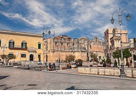 Matera, Basilicata, Italy - March 17, 2017: Cityscape Of The Vittorio Veneto Square With The Entranc