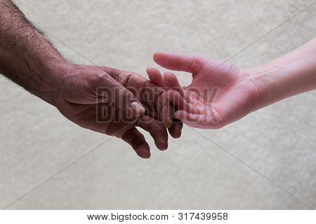 Boy And Girl  Hands Of Different Skin Color Approaching. Tenderly, Honey



Boy And Girl Hands Of Di