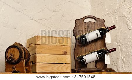 Wine Bottles With Prices On Window Display Of Shop. Alcoholic Drink Bottles. Text Space