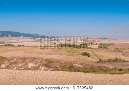 Countryside Landscape With Barren Fields And Dry Soil. Drought, Global Warming Ecology Catastrophe