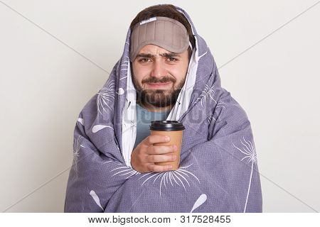 Indoor Shot Of Handsome Bearded Man In Plaid Holding Coffee Cup Over White Studio Background, Guy Fe