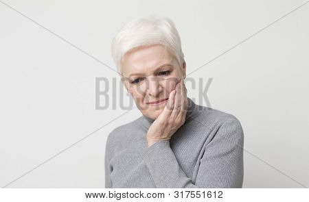 Teeth Problem. Elderly Woman Suffering From Strong Tooth Pain, Panorama With Copy Space