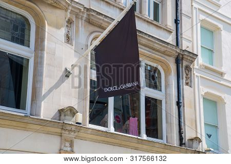 London, Uk - August 13, 2019: Logo Of The Dolche And Gabbana Brand On The Old Bond Street,  Major Sh