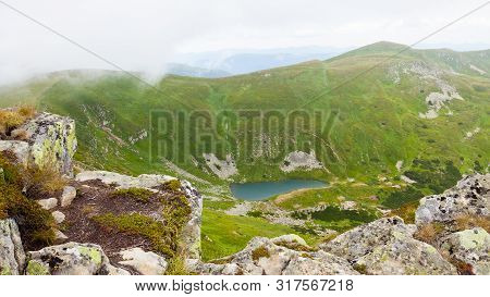 Lake Brebeneskul In The Carpathian Mountains, View From The Top
