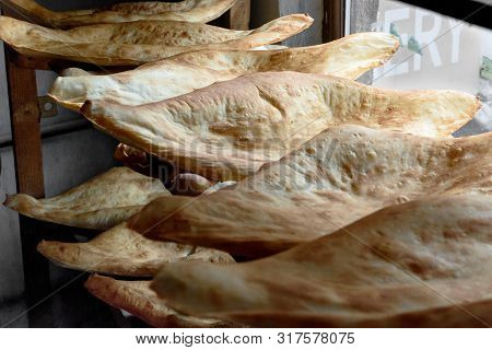 Freshly Baked Shotis Puri - Traditional Georgian Bread