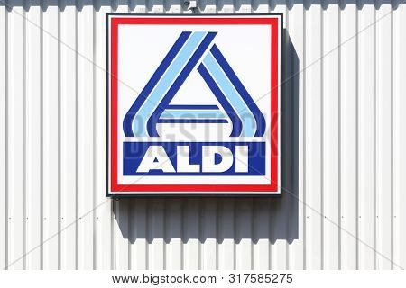 Civrieux, France - August 9, 2019: Aldi Logo On A Wall. Aldi Is A Leading Global Discount Supermarke