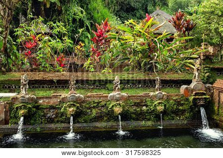 Sacred Spring At The Gunung Kawi Sebatu Temple, Ubud, Bali, Indonesia.