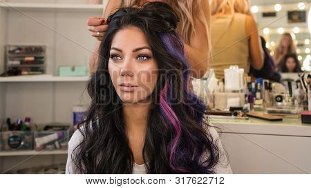 Portrait Of Stylish Brunette. Girl Makes An Evening Haircut In Beauty Salon. Work Of Hairstylistgirl
