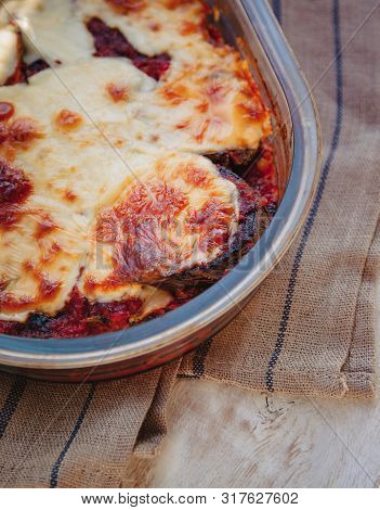 Eggplant Alla Parmigiana Melanzane Close Up In Baking Dish. Horizontal. Delicious Eggplant Alla Parm