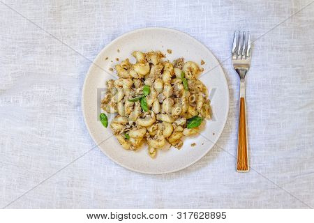 Traditional Soviet Russian Pasta Dish, Vermicelli, Navy Pasta, With Meat On A White Plate On A Light