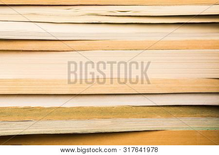 Vintage Books In Stack. Library With Many Old Books Background. Horizontal Shot. Education, Knoledge