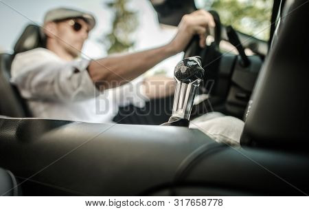 Automatic Transmission Shifter Inside Modern Convertible Vehicle. Car Driving Concept. Automotive Te