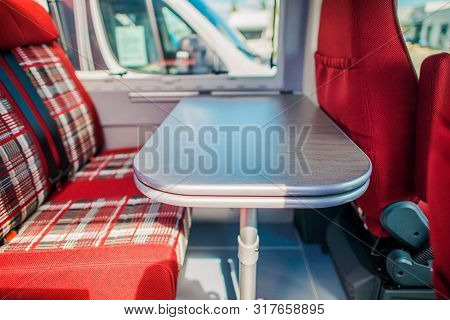 Elegant Modern Camper Van Rv Dinette Table. Cooking And Eating During Rv Road Trips. Motorhome Inter