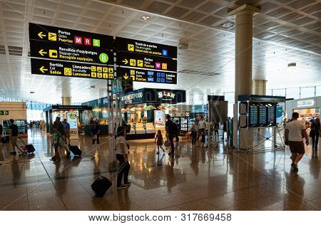 Barcelona, Spain. August 2019: Passengers In Transit In Terminal 2 Of Barcelona International Airpor