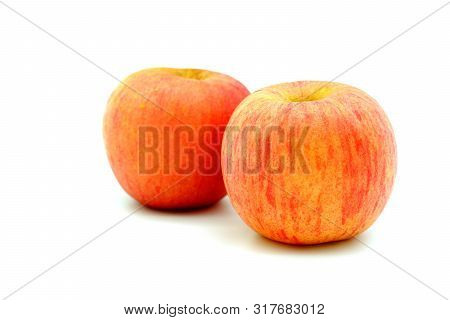 Two Fuji Apple Isolated On White Backgrpund. Clipping Path.