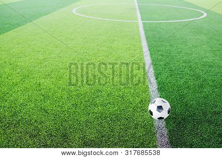 Soccer Ball On Artificial Turf For Green Background.