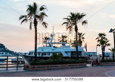 Denia, Spain - June 27, 2019: Luxury Yacht Moored In The Marina Of Denia At Sunset. Alicante, Spain