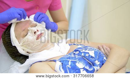Close-up. Face Of A Woman At A Beautician Appointment. Manual Facial Cleansing. Cleansing Facial Ski