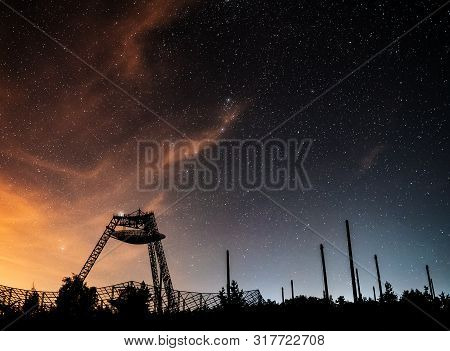 Antenna Of The Station Of Exploration Of An Ionosphere. A Silhouette Against The Background Of The N