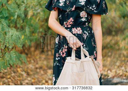 Caucasian Girl Holds Linen Shopper On Sunset Outdoors. Zero Waste Eco Friendly Conscious