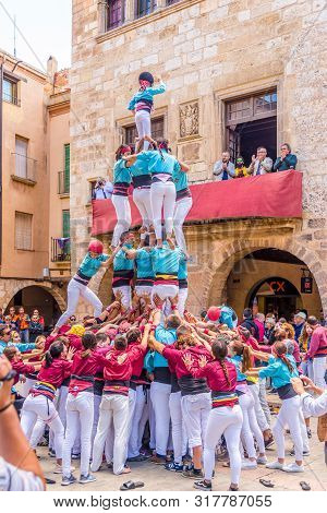 Montblanc,spain - May 19,2019 - Building Human Towers In The Streets Of Montblanc. The Area Around M