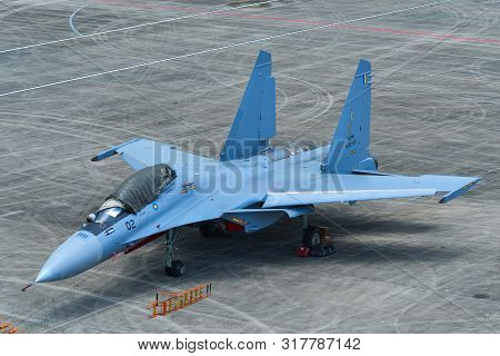 Military Aircraft Docking At The Airport