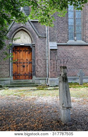 Close-up On A Statue In The Courtyard Of Sint Martinuskerk Church, Located In Wyck Neighborhood, Lim