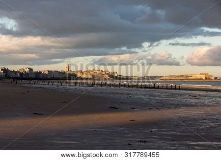 The Morning Light On The Plage Du Sillon And Walled City. Saint Malo , France, Ille Et Vilaine, Emer