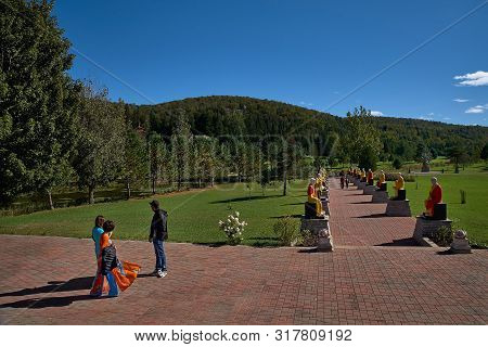 Harrington, Qc, Canada - September 23, 2018: Tourists At The Tam Bao Son Buddhist Temple In Quebec D