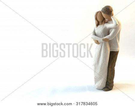 Figures - A Couple In Love. Figurines - He And She, Love Forever. Statuette - A Guy And A Girl Hug A