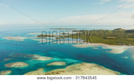 Seascape: Tropical Islands With Beaches And Azure Coral Reef Water From Above. Bucas Grande, Philipp