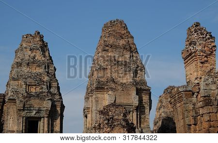 Stone Towers Of A Medieval Khmer Temple. Baray Eastern Mebon.