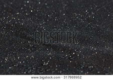 Dark Gray Waterproof Hydrophobic Flat Cloth Closeup With Rain Drops Selective Focus Background