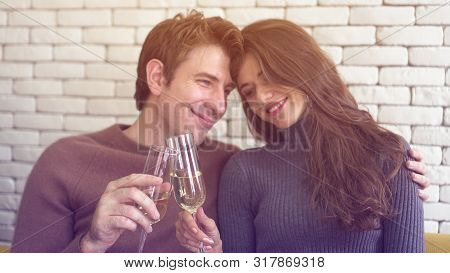 Caucasian Couple Celebrate Early Christmas Morning Light