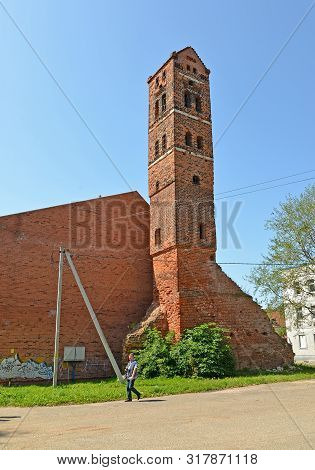 Neman, Russia - July 28, 2019:  Clock Tower Of The Medal Ragnit Lock In The Summer. Kaliningrad Regi