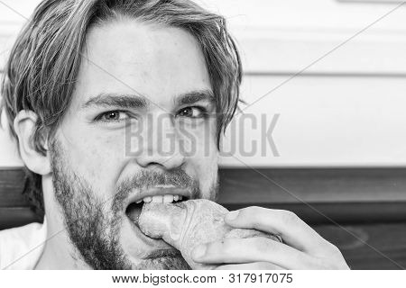 Handsome Young Man Enjoying His Morning Cup Of Coffee Laying In Bed Hotel Room Happy Smiling. Handso