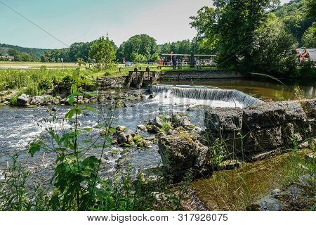 Han-sur-lesse, Belgium - June 25, 2019: Green Landscape With Rapid On Lesse River When It Leaves The