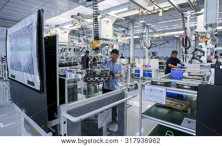 Workers At Engine Assembly Plant