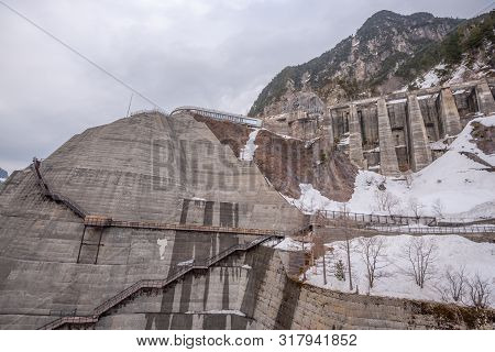 Scene Of Kurobe Dam Between Snow Wall At Tateyama Kurobe Alpine Route, Japan
