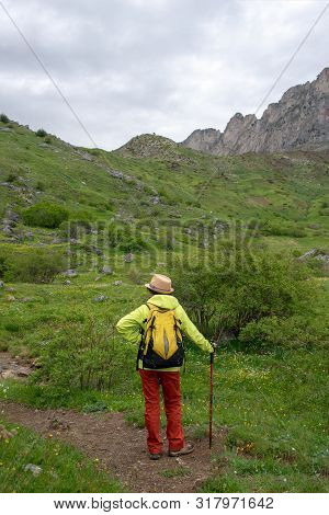 Hiker Woman With A View Of Tena Valley In The Pyrenees, Formigal,  Huesca, Spain