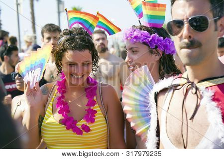 The Annual Parade Lgbt. Gay And Lesbians Walking In The Gay Pride Parade. Parade Of Tolerance. Rainb