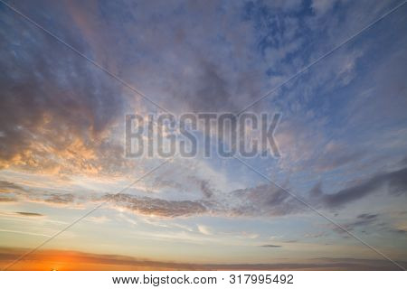Dramatic Sunset Sky With Orange Clouds G