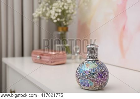 Stylish Catalytic Lamp On White Table Indoors, Space For Text. Interior Element