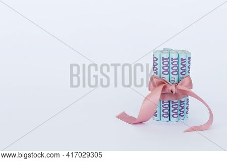 Ukrainian Money. 1000 Banknotes In A Roll With A Ribbon