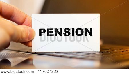 Financial Business Card With The Text Pension. Decrease In Pension Payments. Low Pension Concept.