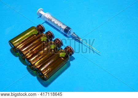 Used Vials Of Drugs Are On The Table